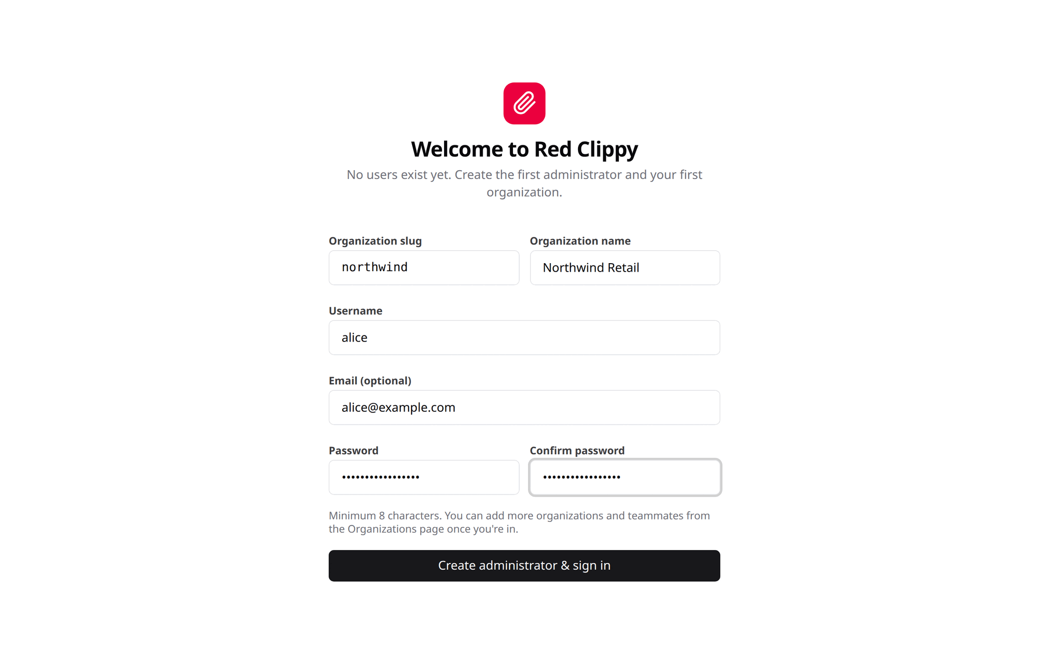 The first-run setup wizard, with the organization slug, display name, username, optional email and password filled in